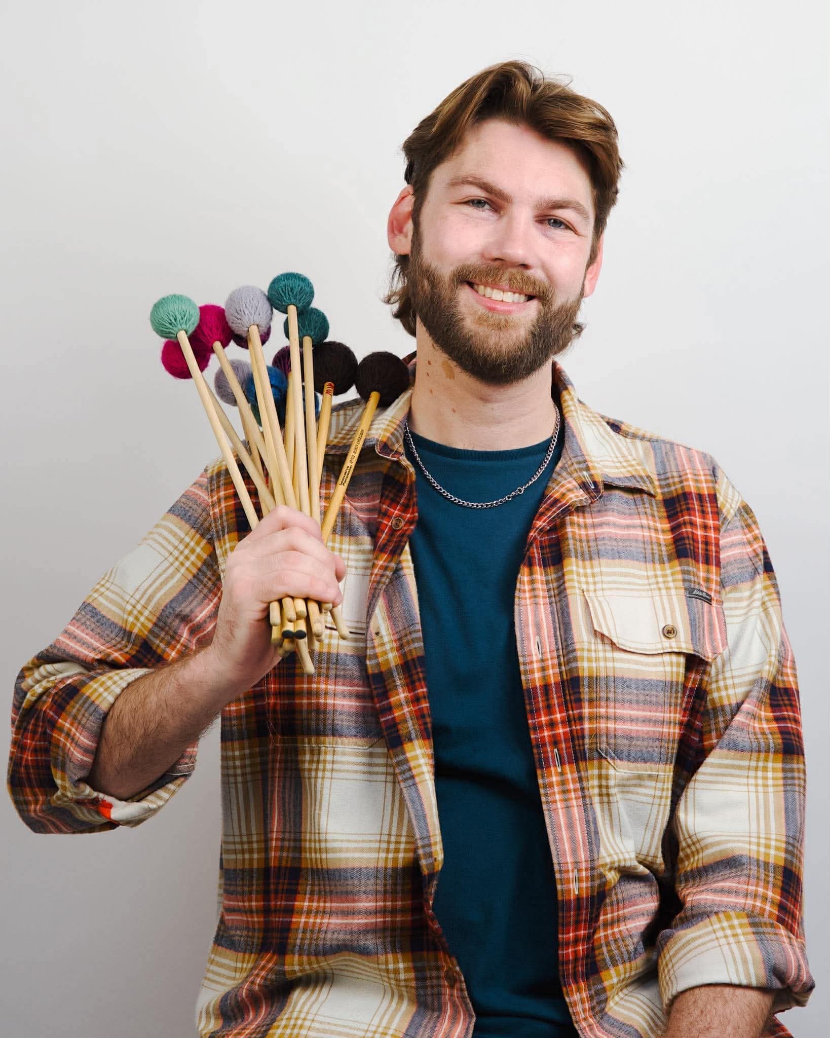 Ben holding mallets
